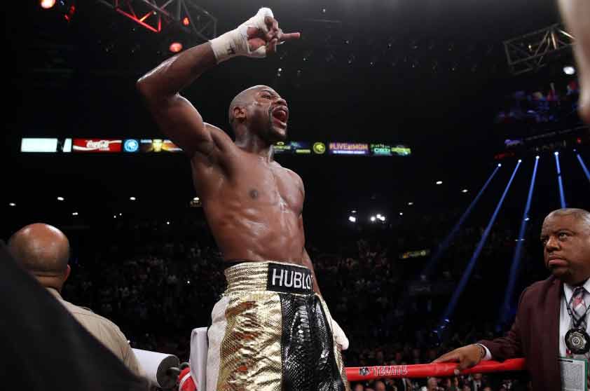 Floyd Mayweather - Crédito: Chris Farina / Top Rank