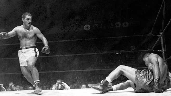 Rocky Marciano derriba a Joe Louis