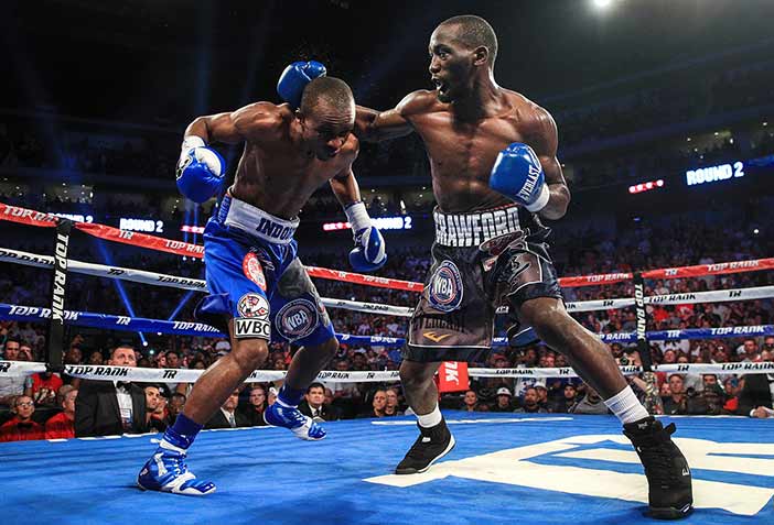 Indongo y Crawford (Foto: Mikey Williams / Top Rank)